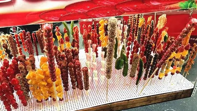The Economics of Candied Hawthorn Stands at Harbin Ice World