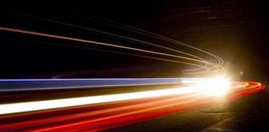 Why Photons Travel at Light Speed Instantly