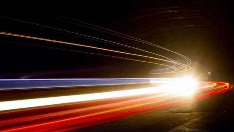 Why Photons Travel at Light Speed Instantly